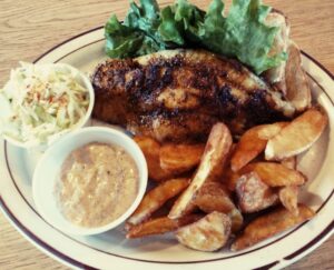 Cajun Catfish with wedge fries and slaw from A Pine Restaurant in Pequot Lakes, MN